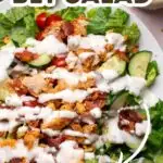 Pinterest graphic with text and photo of crispy chicken blt salad with ranch dressing.