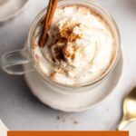 Pinterest graphic with text and photo of mug with cinnamon white hot chocolate.