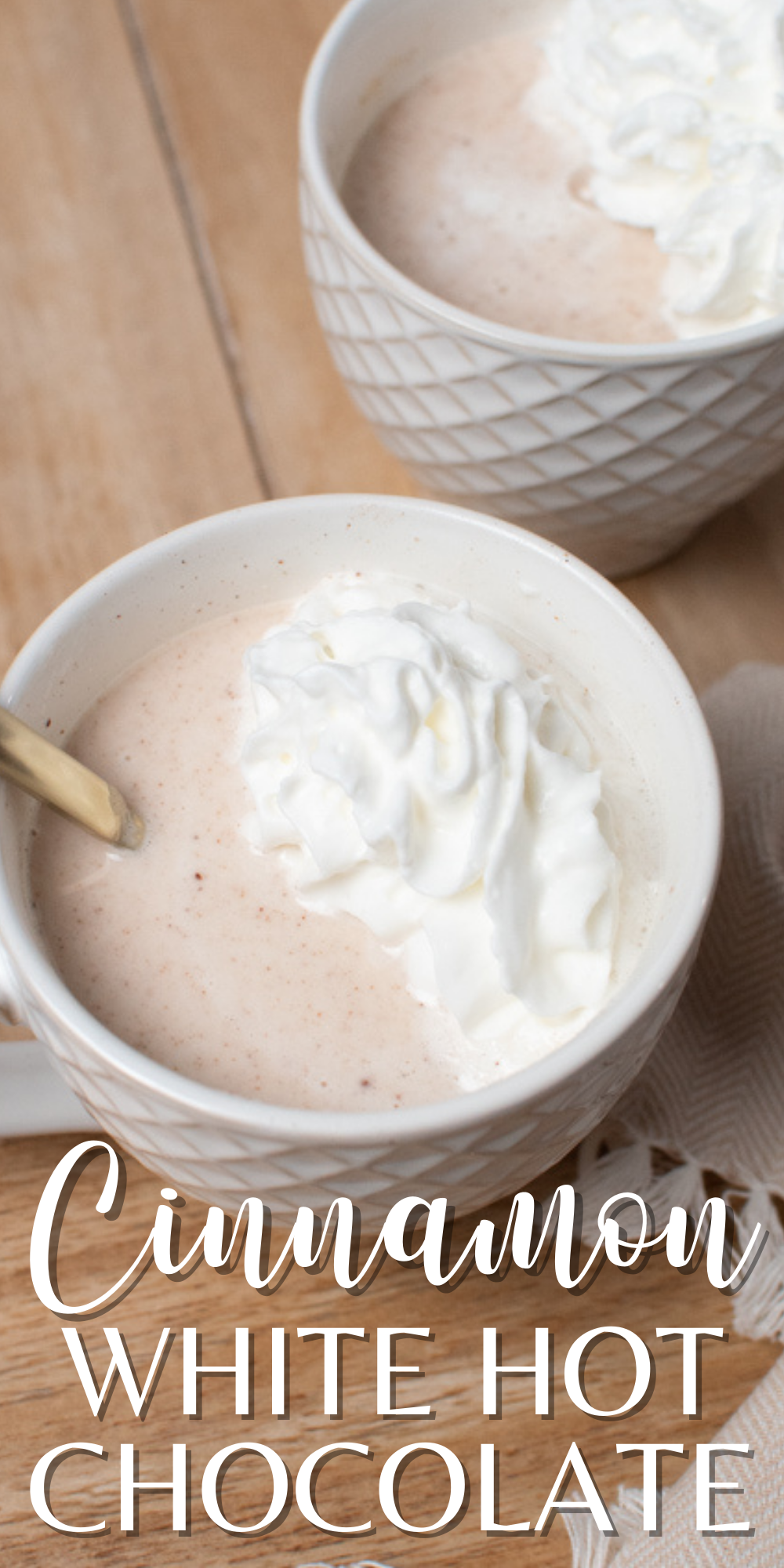 A Pinterest graphic with text and two cups of white hot chocolate.