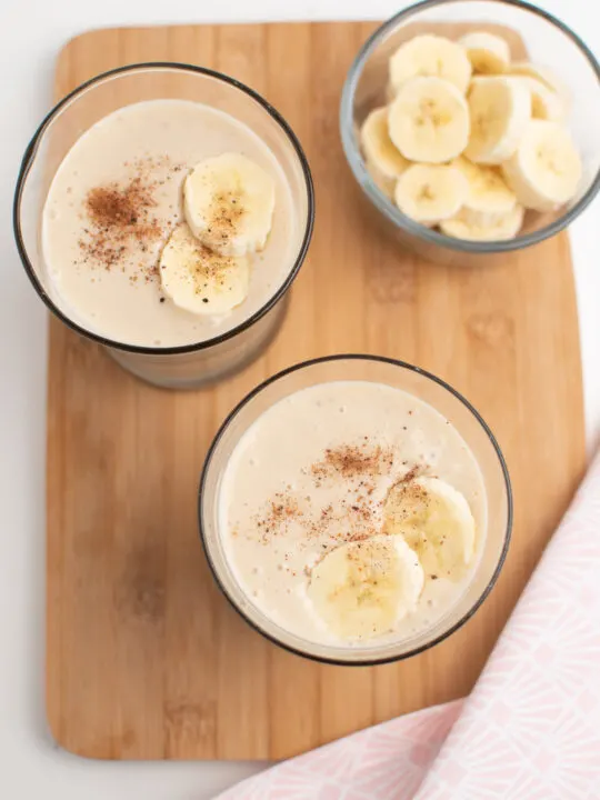 Two glasses of banana smoothie.