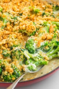 Close up of broccoli casserole with crunchy topping.