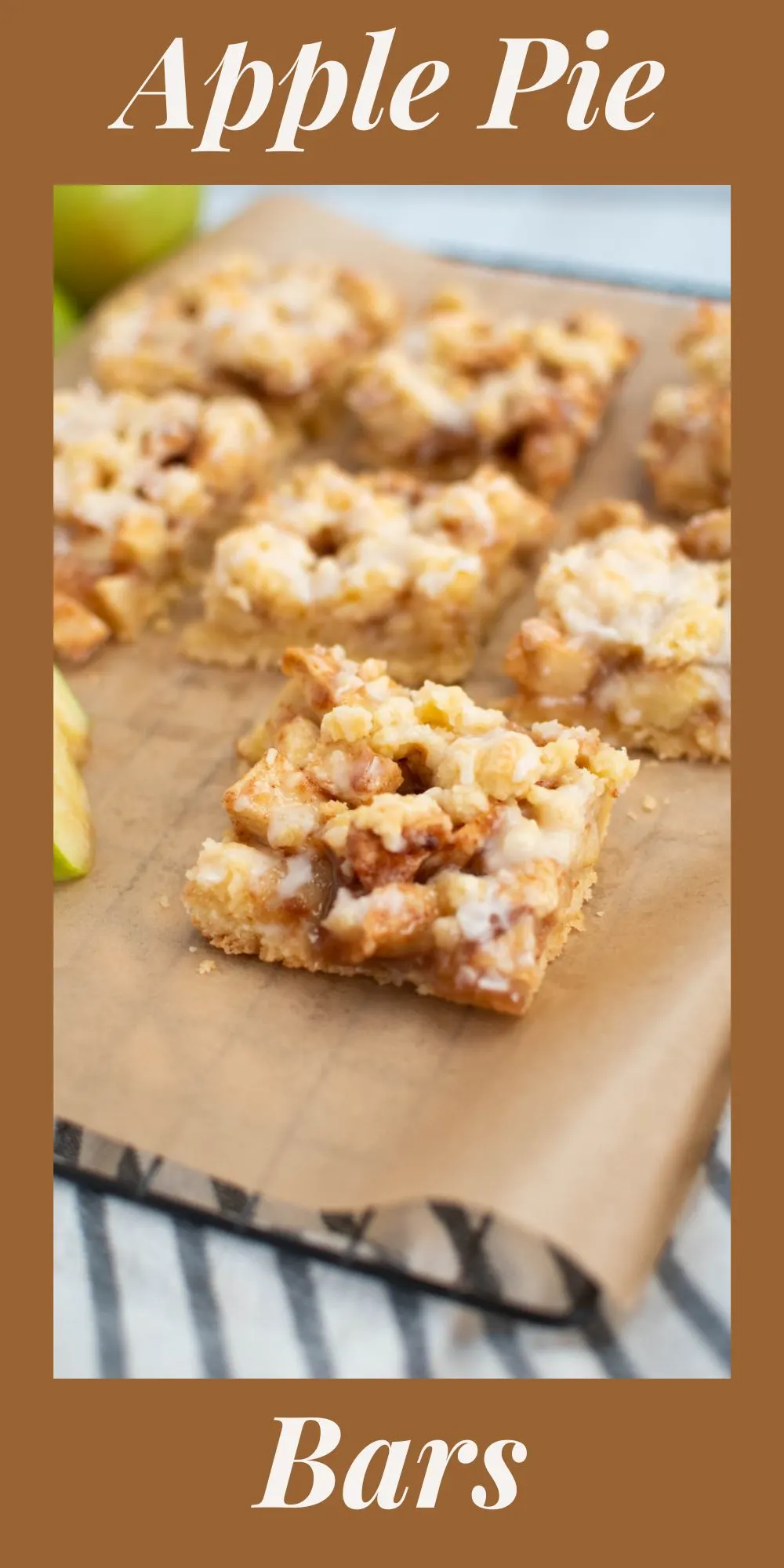 Pinterest graphic with text and photo of apple pie bars on parchment paper.