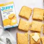 Pinterest graphic with photo and text that reads "moist Jiffy cornbread without sour cream."