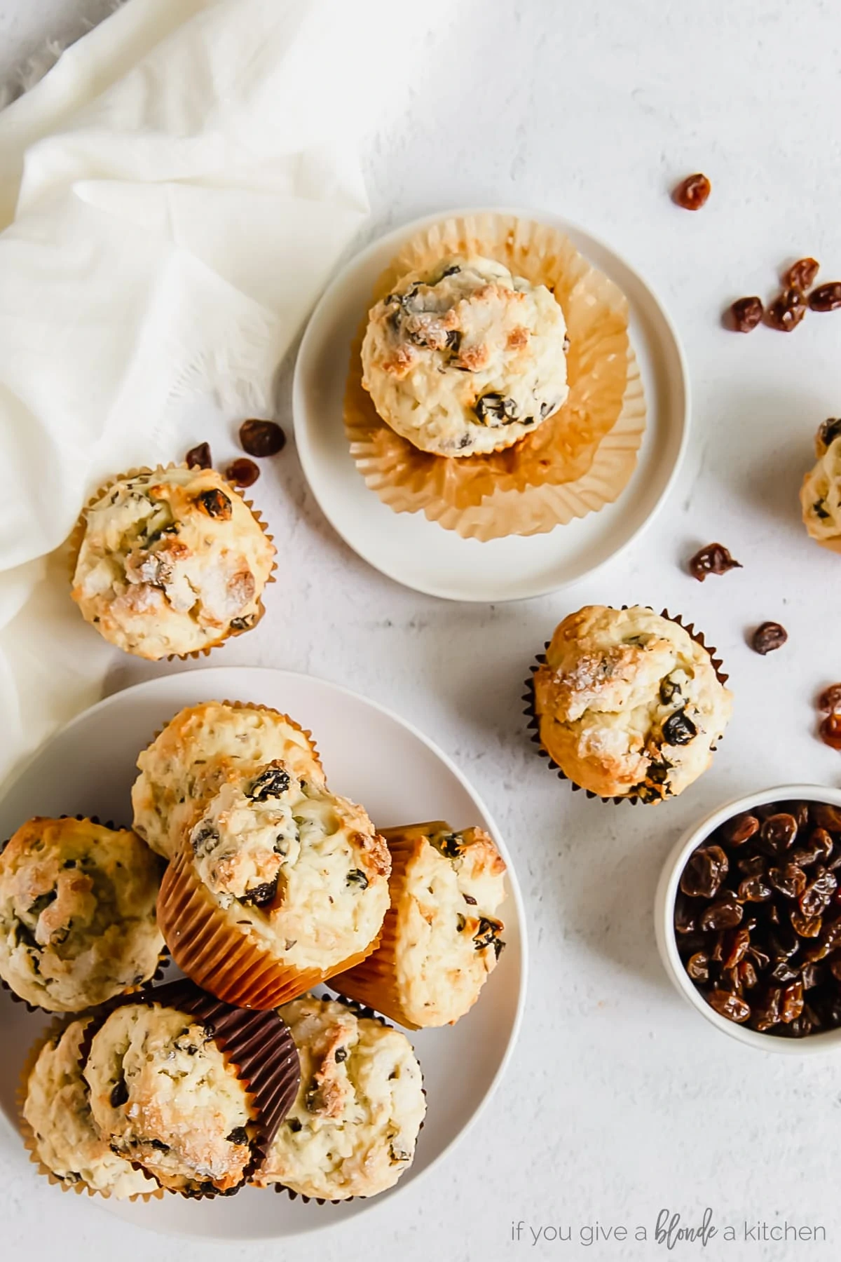 Irish soda bread muffins in a white bowl and on a white plate.