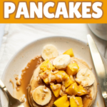 Tropical pancakes on a plate with text that reads "aloha protein pancakes."