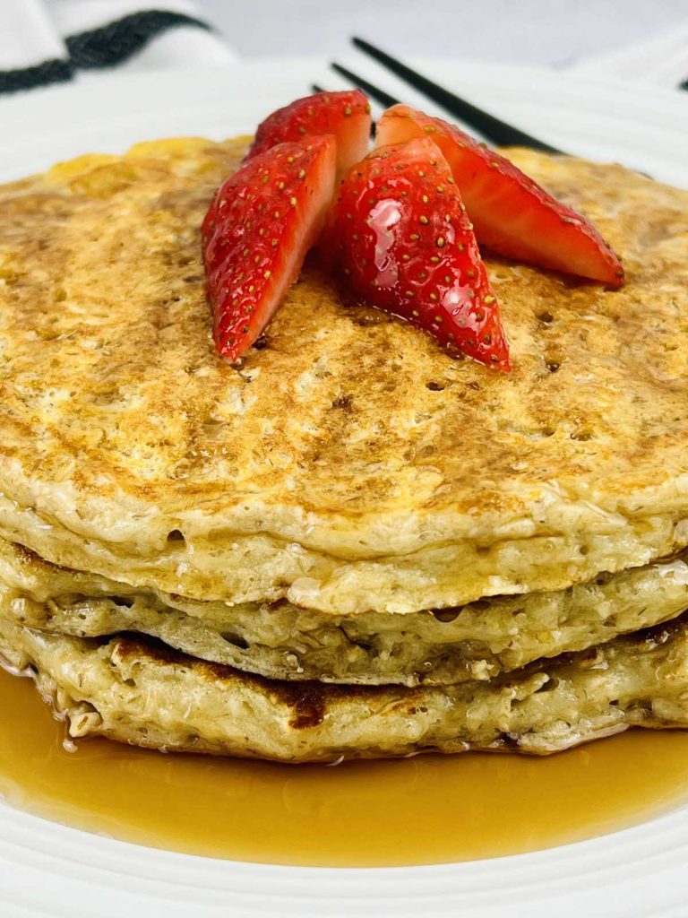 High protein pancakes with strawberries on top.