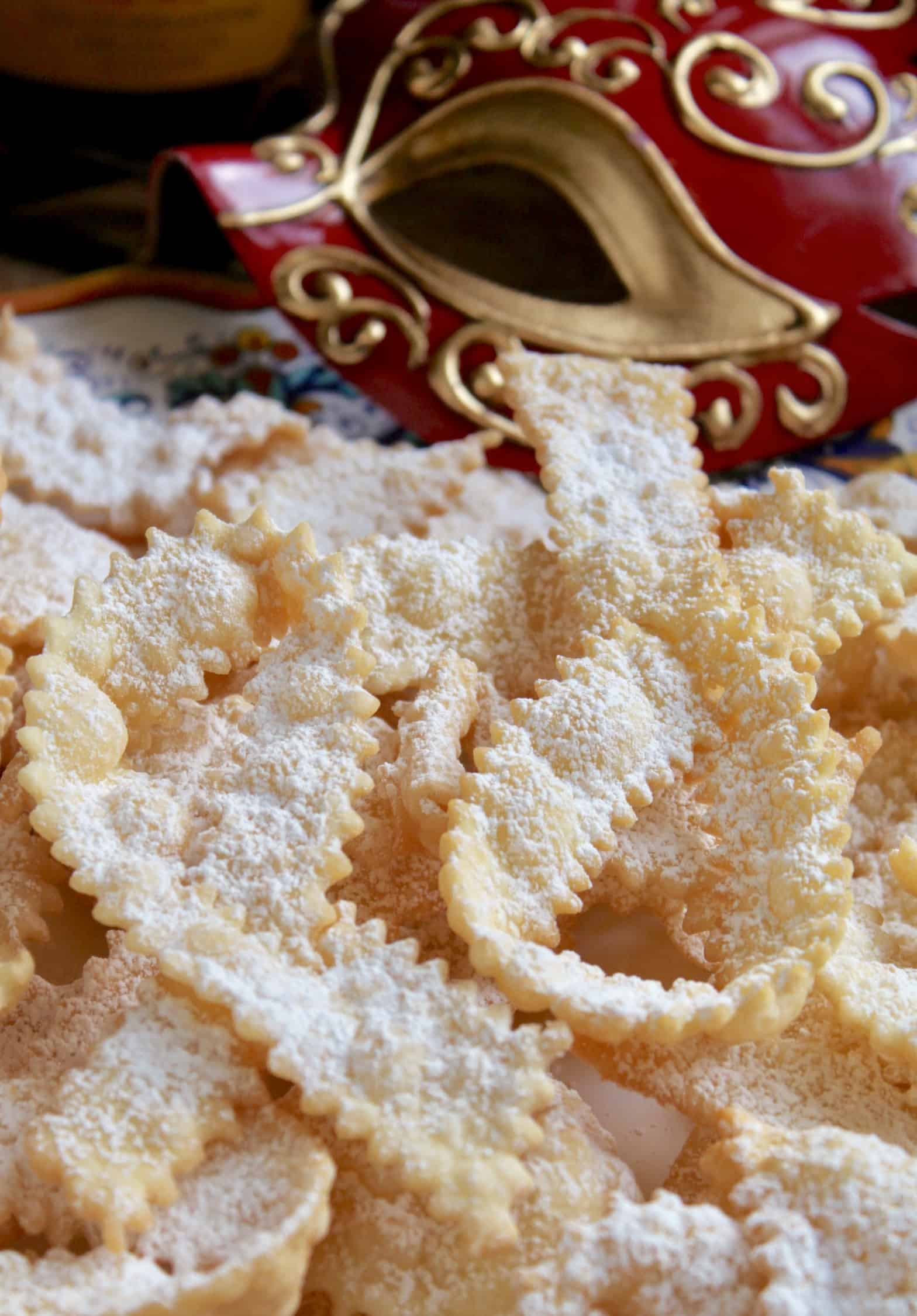 Carnival cookies with powdered sugar on top.