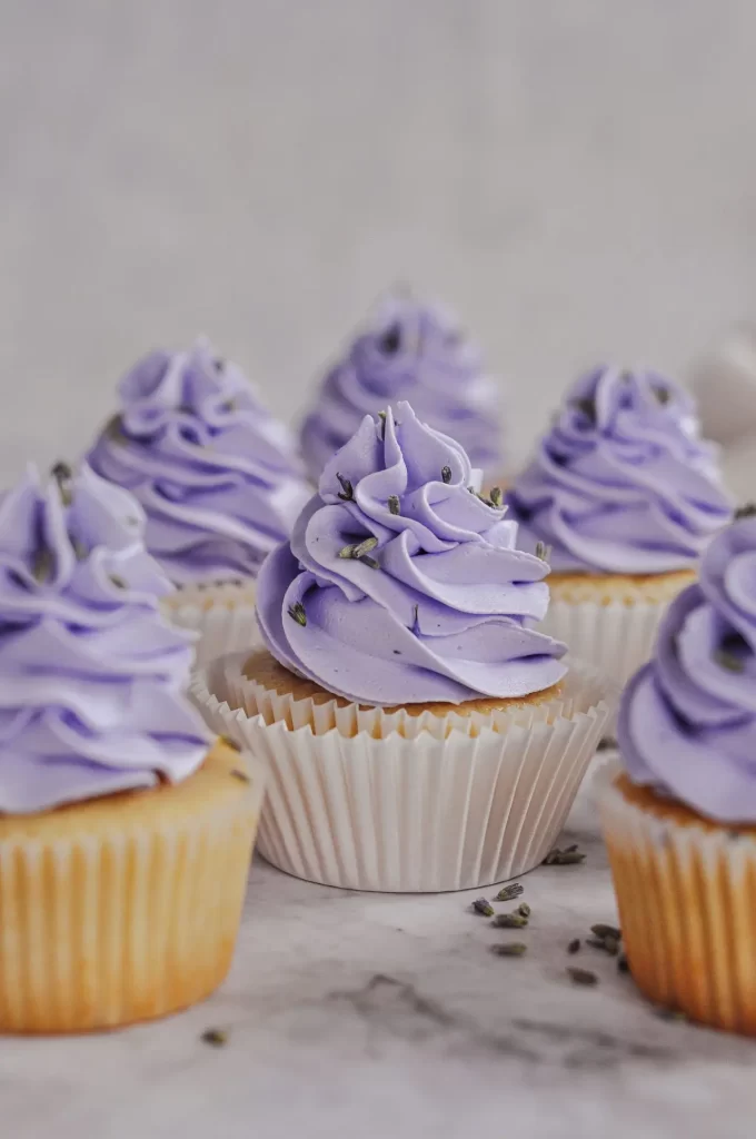 Honey lavender cupcakes with purple frosting.