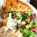 Photo of falafel bowl with text that reads "easiest dinner ever."