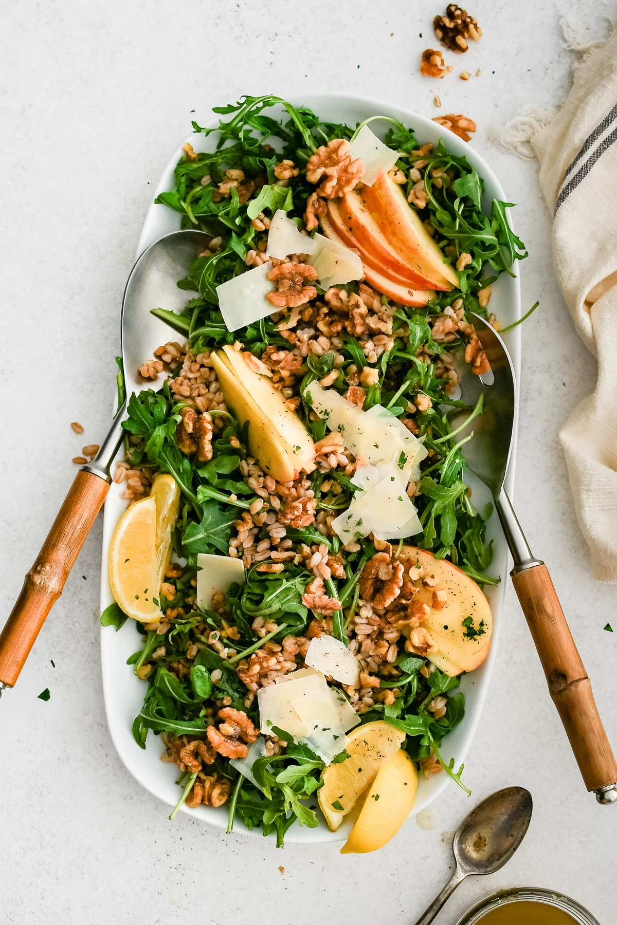 Pear and apple salad with cheese and nuts on top.